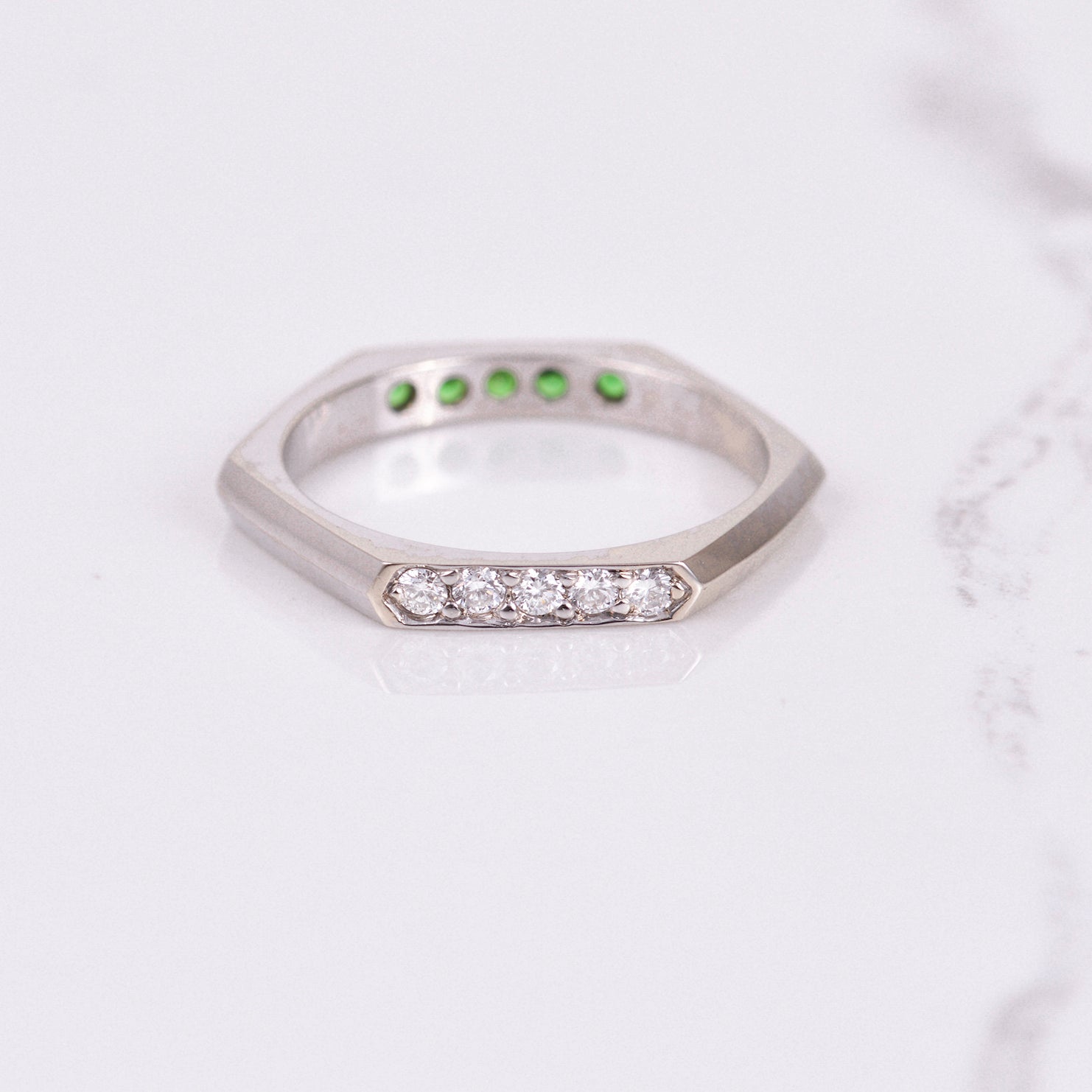diamond and tsavorite garnet hexagon band in white gold