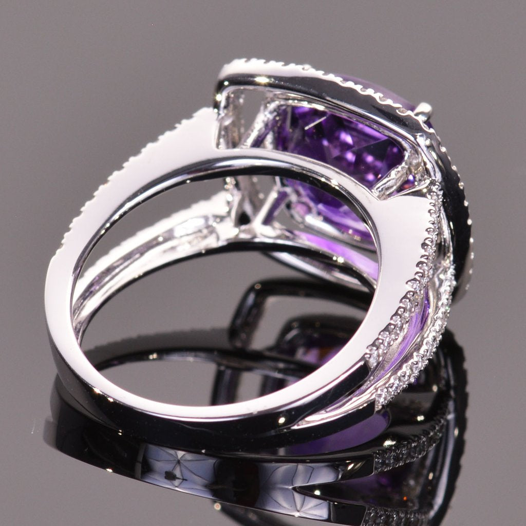 cushion amethyst ring with diamond double halo in white gold.