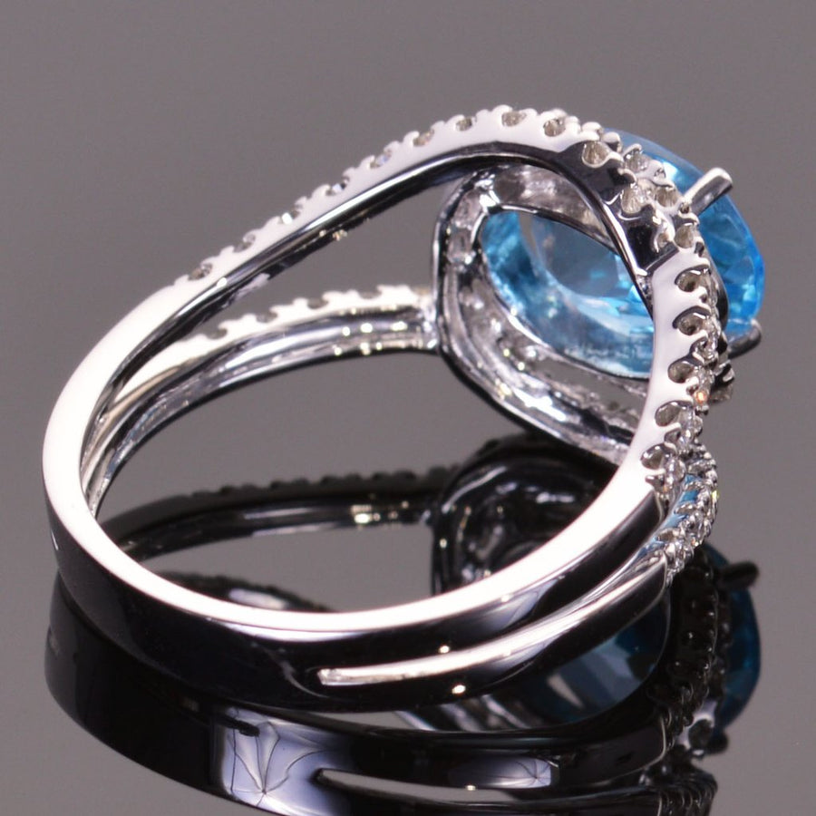 Blue Topaz and Diamond Infinity Ring in white gold