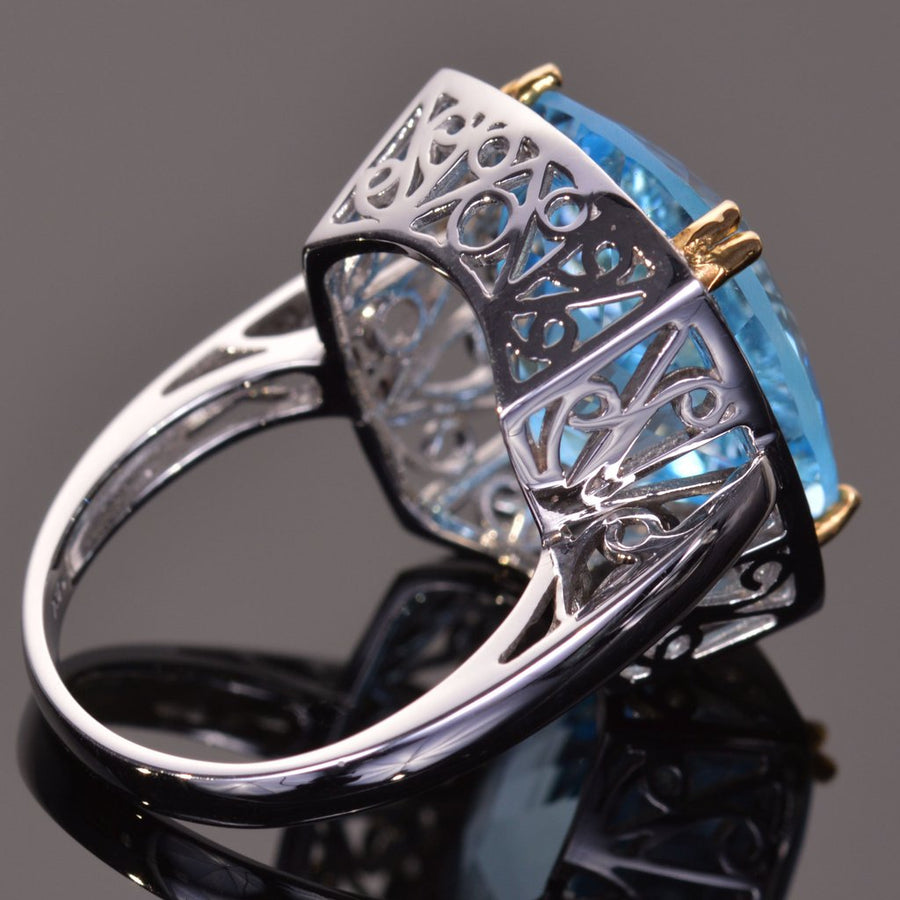 cushion blue topaz and sapphire halo ring