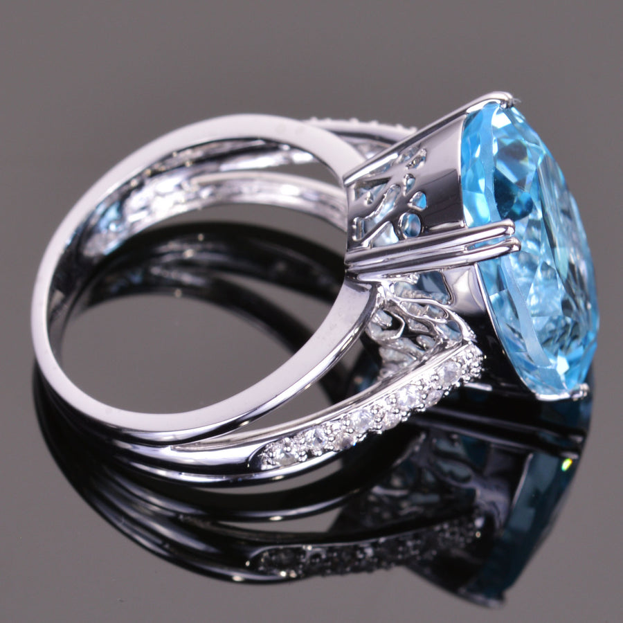 Oval Blue Topaz and White Sapphire Ring