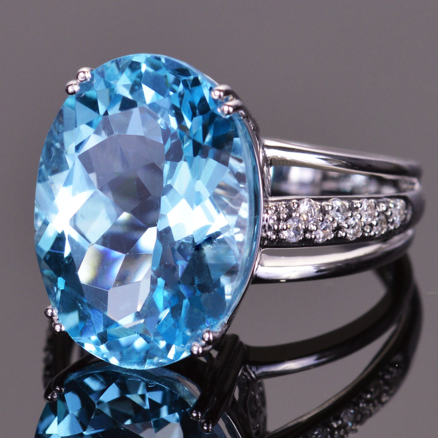 Oval Blue Topaz and White Sapphire Ring