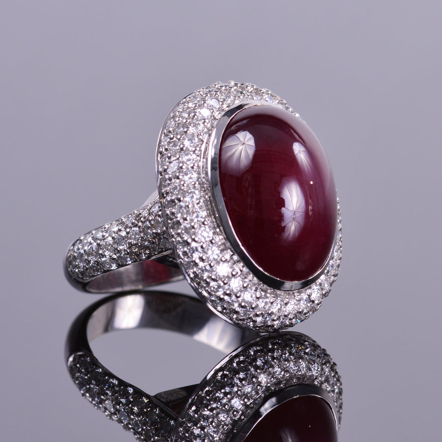 Ruby Cabochon Diamond Ring with a Pave Halo