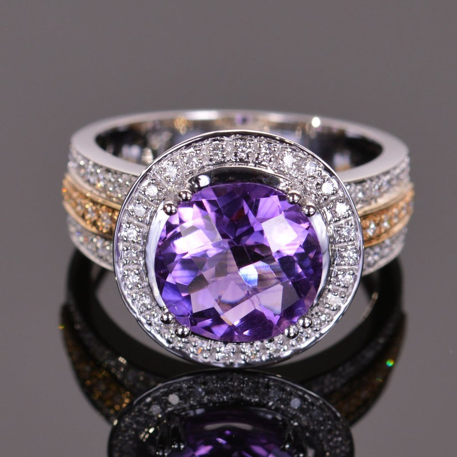 round amethyst and diamond ring in 14k yellow and white gold