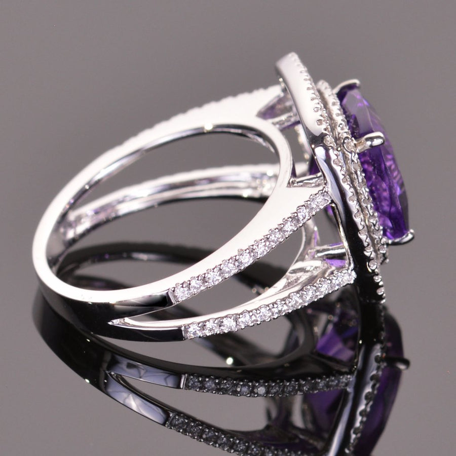 cushion amethyst ring with diamond double halo in white gold.