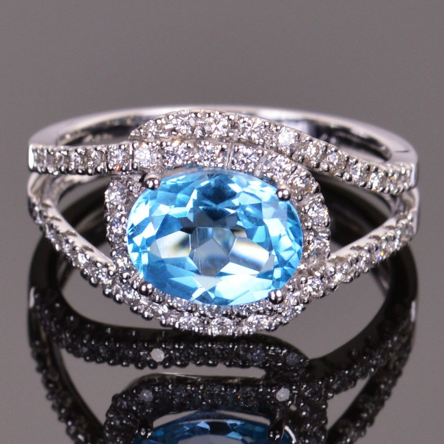 Blue Topaz and Diamond Infinity Ring in white gold