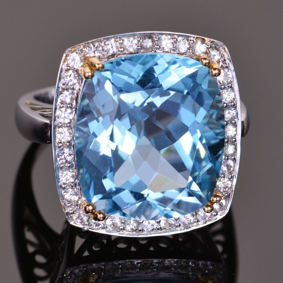 cushion blue topaz and sapphire halo ring