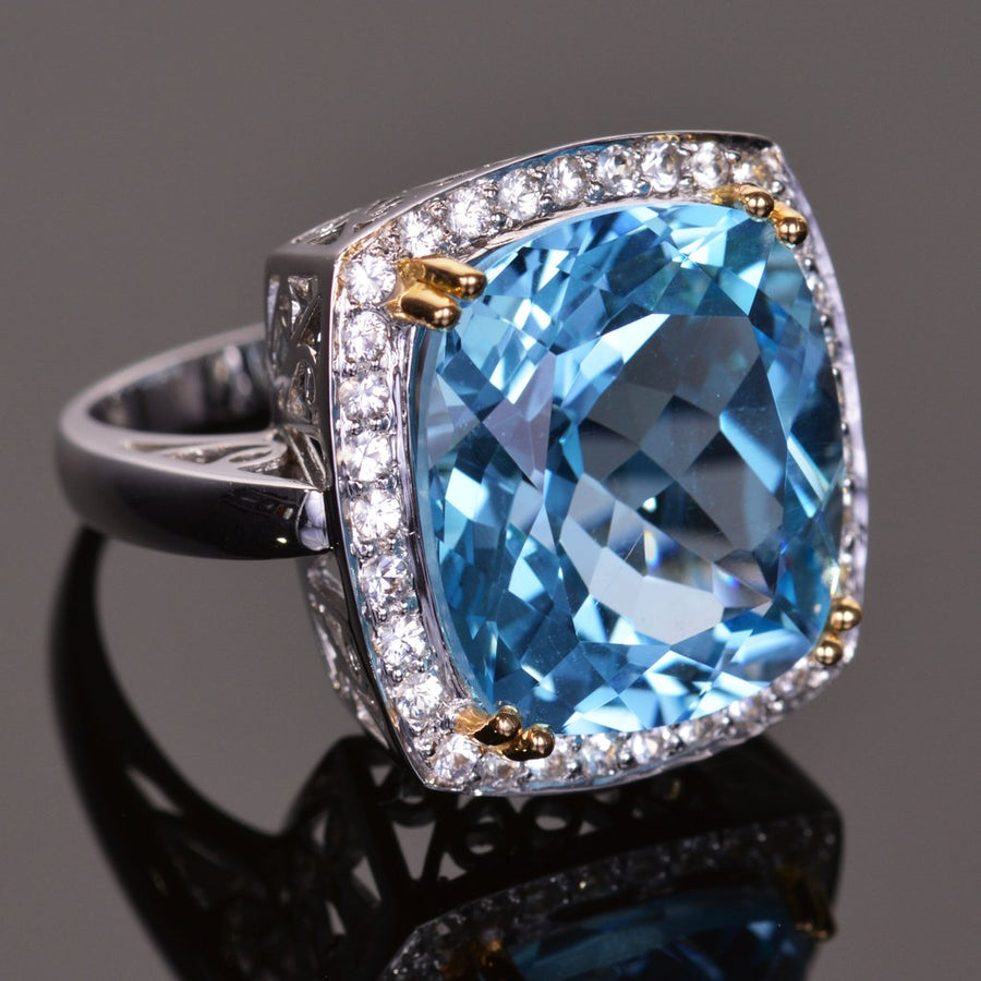 cushion blue topaz and sapphire halo ring