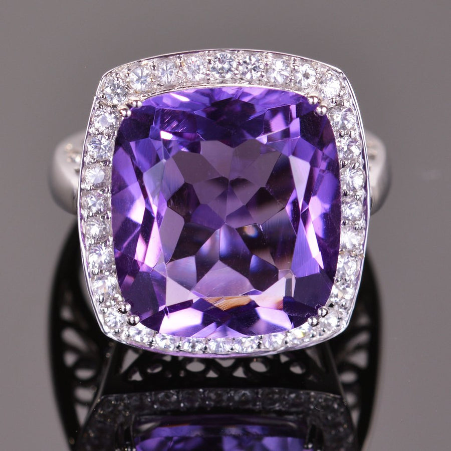 cushion amethyst ring with sapphire halo in white gold