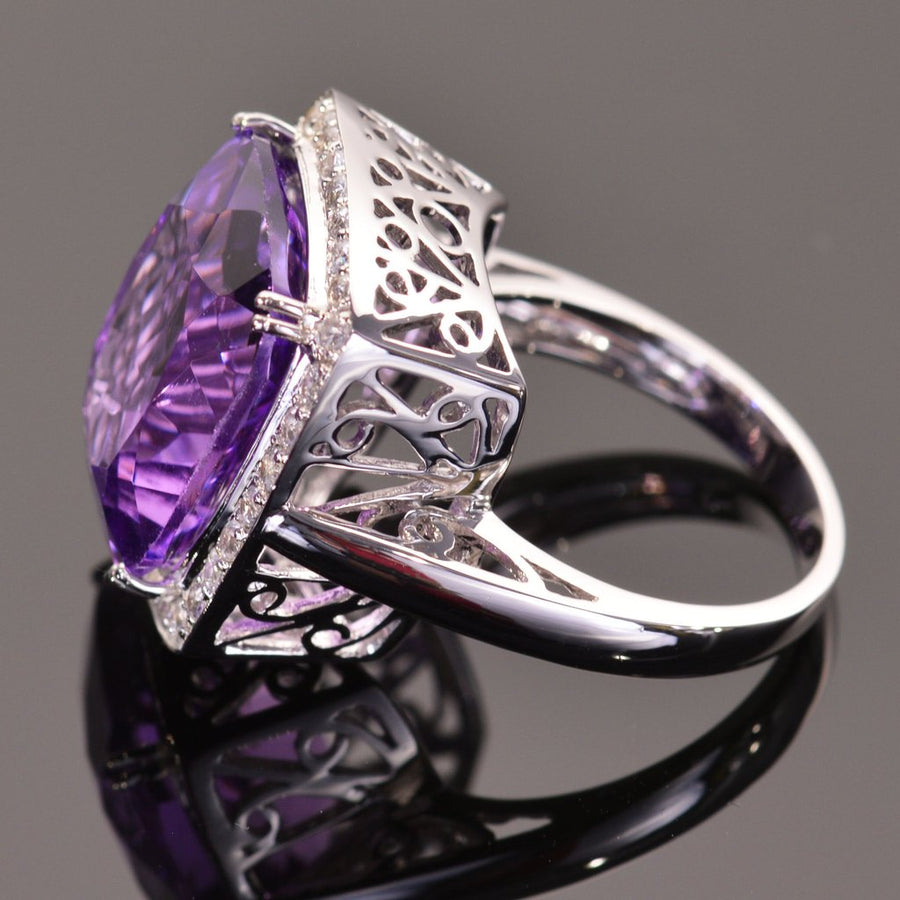 cushion amethyst ring with sapphire halo in white gold